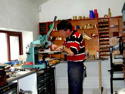 Paul Curtis at work in the bookbindery
